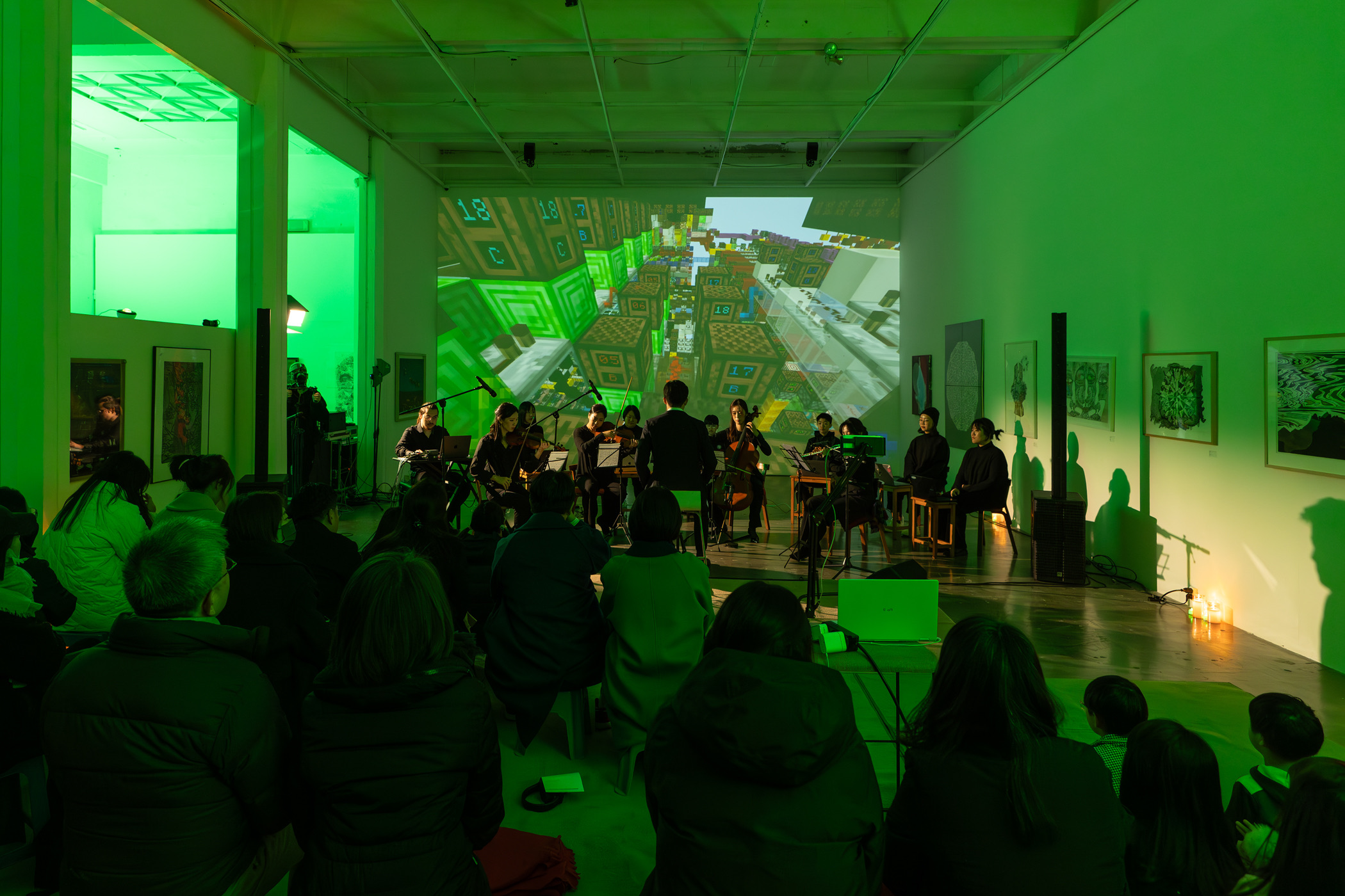Musicians, Minecraft projections and the audience share the gallery at Total Museum of Contemporary Art in Seoul